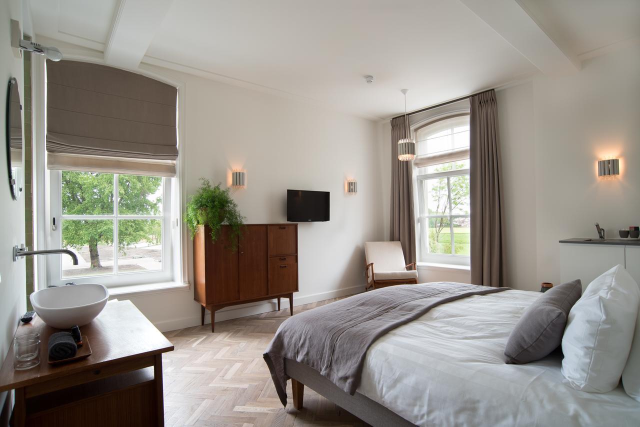 Boutique Hotel De Witte Dame Abcoude Esterno foto